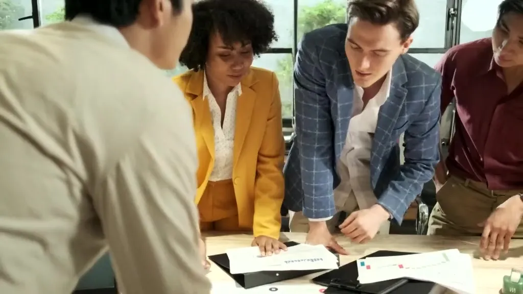 A cross-disciplinary team develops and reviews a proposed solution together.